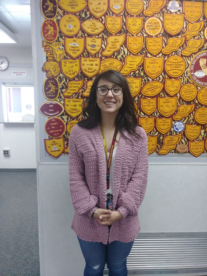 Ms. Ceja is all smiles about her new job as secretary.