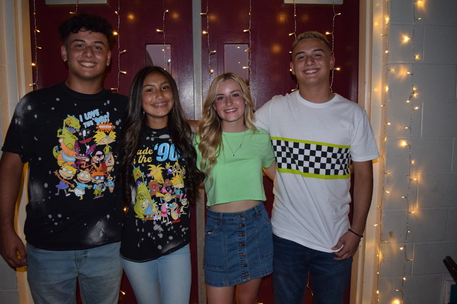 James Lonnon, Genesis Vargas, Mia Flores, and Andrew Lonnon enjoy the dance together.