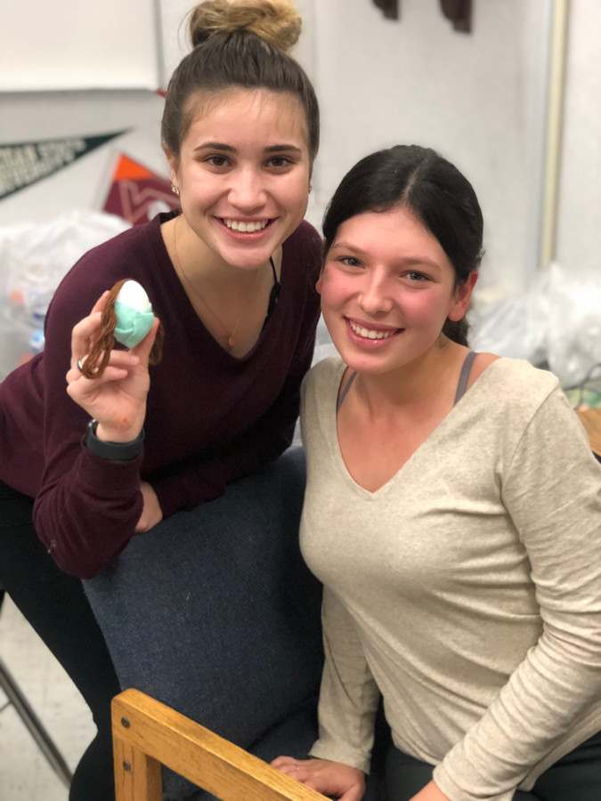 Cassiana Rolicheck and Ally Watkins show off their egg.