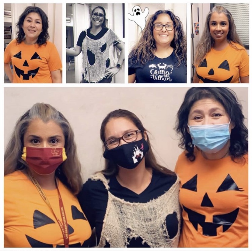 Staff members dressed up for the dress up day Spooky class colors.