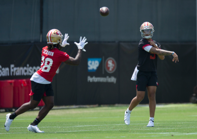 May 14, 2021; Santa Clara, California, USA; San Francisco 49ers quarterback Trey Lance (5) works on his passing during the first day of a rookie minicamp at Levis Stadium. Mandatory Credit: D. Ross Cameron-USA TODAY Sports
