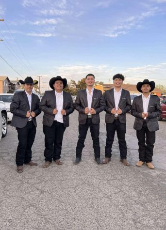 The band group members of Grupo4LB pose before a show.