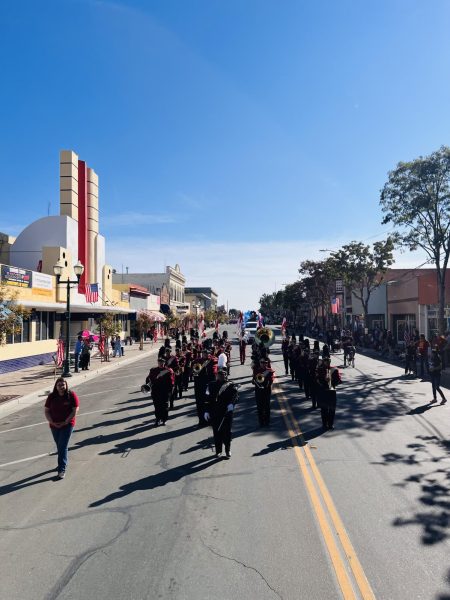 Los Banos High School Band walk in Veterans Parade.