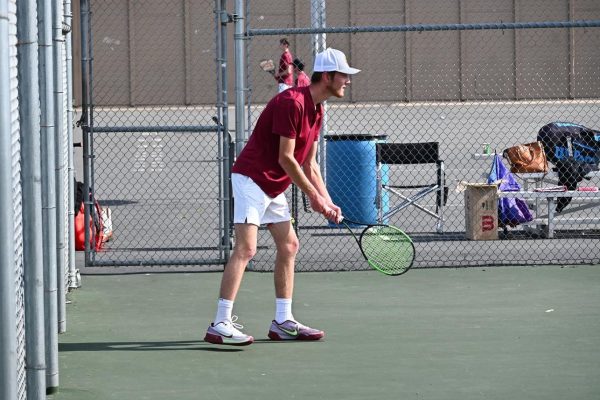 Justin Gould gets ready to receive a serve.