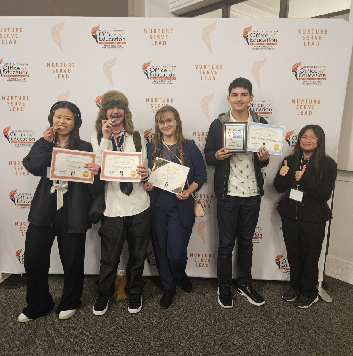 The 2025 Academic Decathlon team:
Marcus Homer (12)
Vivian Le (11)
Claire Austin (10)
Fredy Artiga Hernandez (9)
Eisha Eve Balaba (9)
