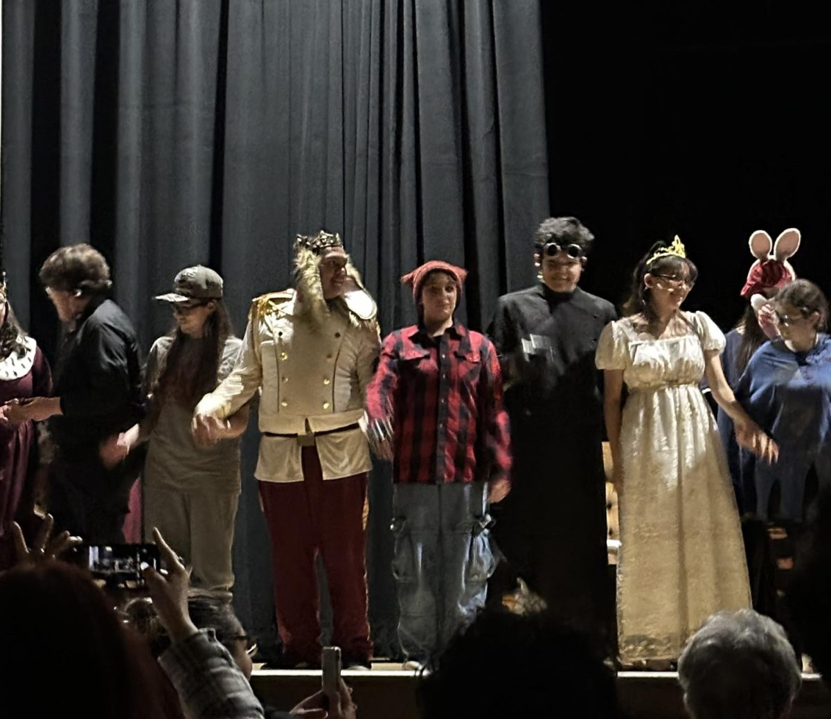 The cast takes a bow.