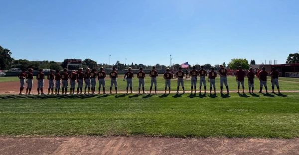 The Tigers lined up before their playoff game against Oakdale.
