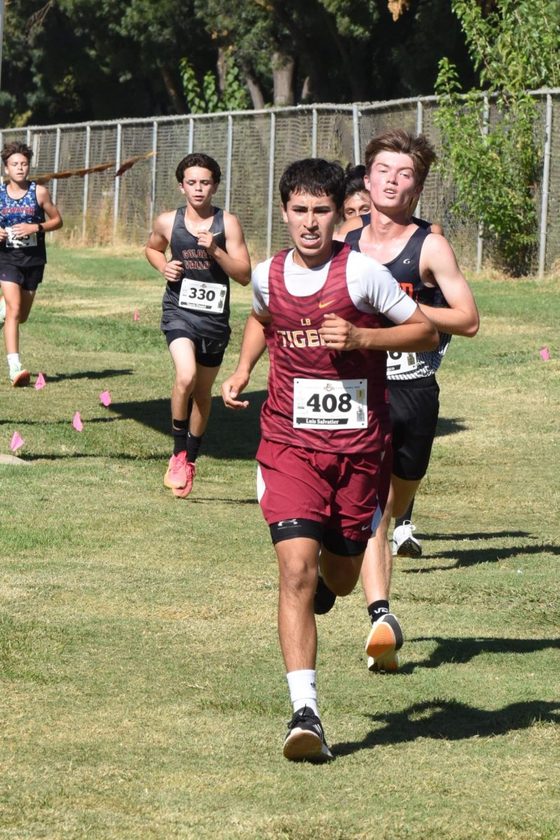 Luis Salvatier #408 pushes himself to finish the race. 