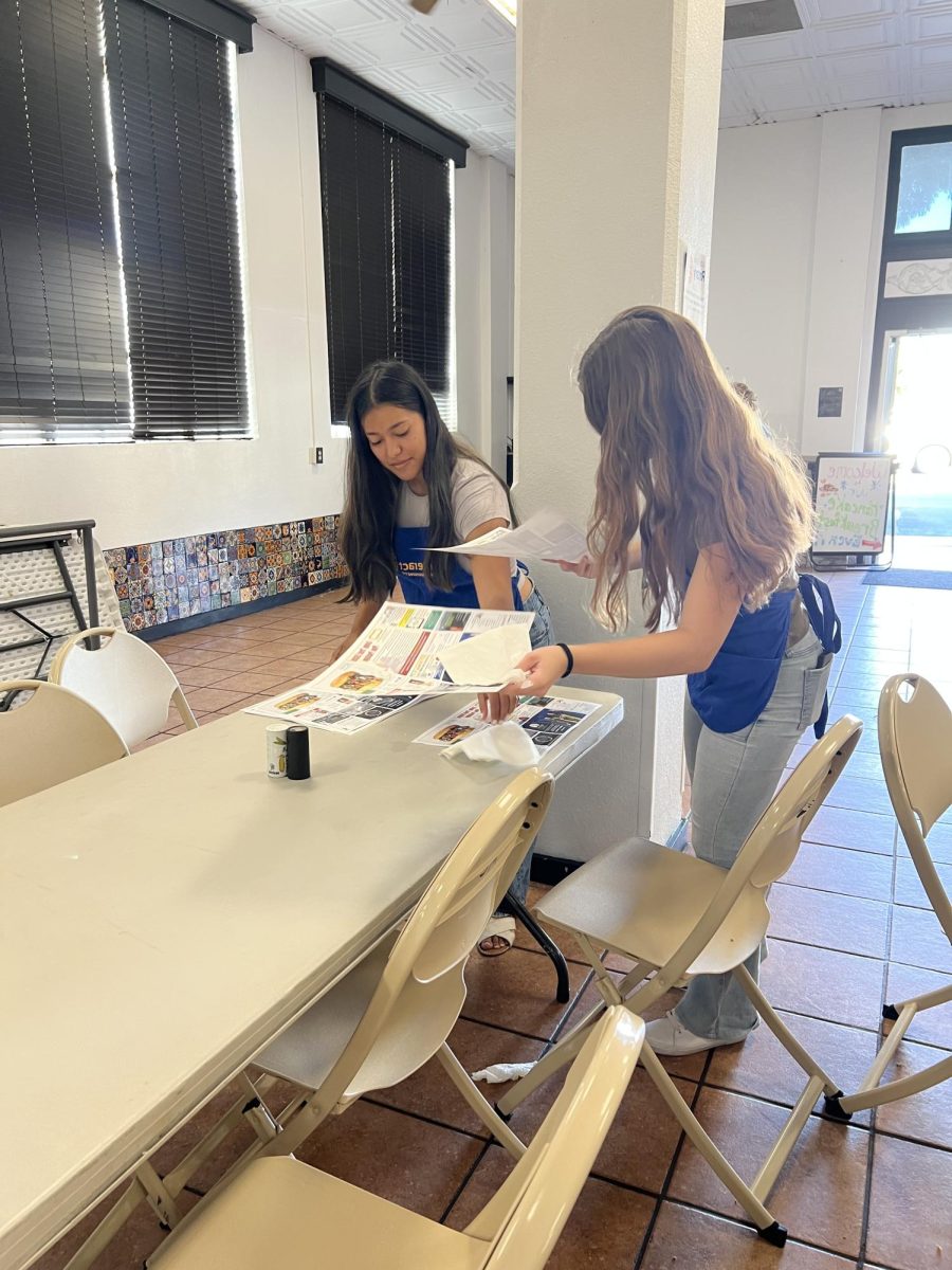 Interact Club members clean up after Pancake Breakfast.