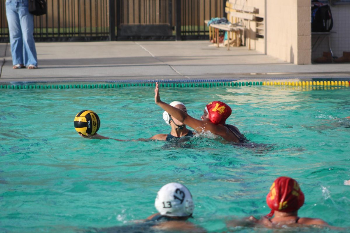 Pantoja #14 plays defense in home game against Merced.