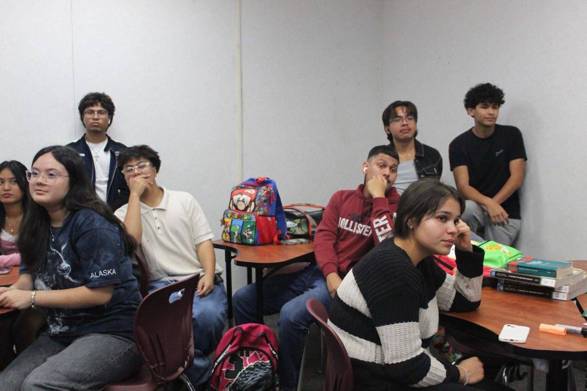 AAPIA members engage in a club discussion.