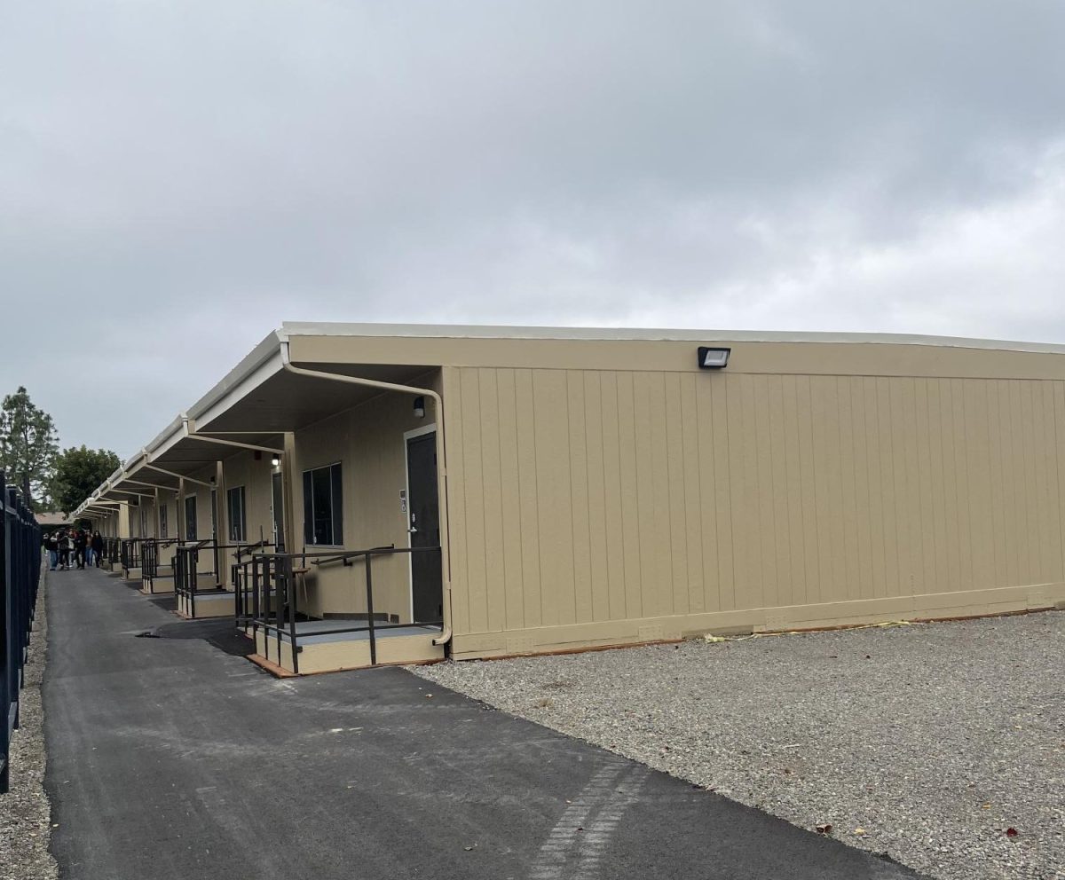 Temporary classrooms by the student parking lot.