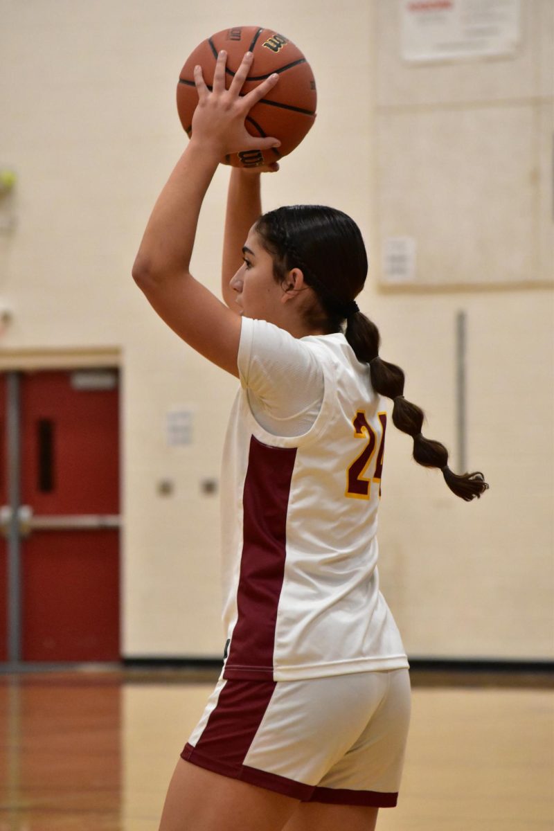 Avery Vierra inbounds the ball.