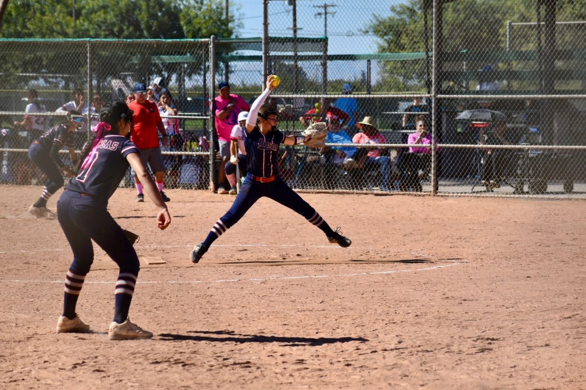 Addison Grove pitches for her team.