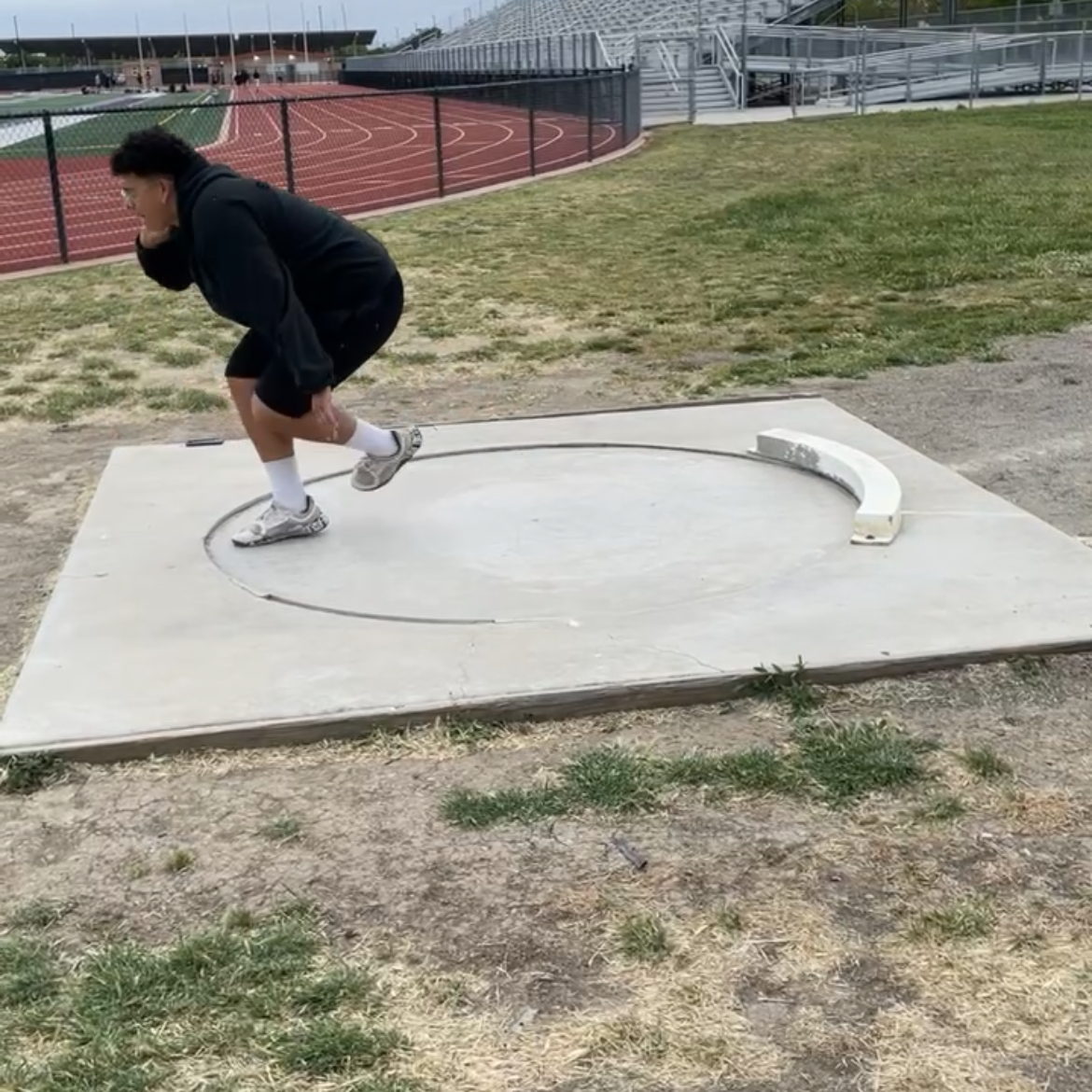 Gustavo practices throwing.