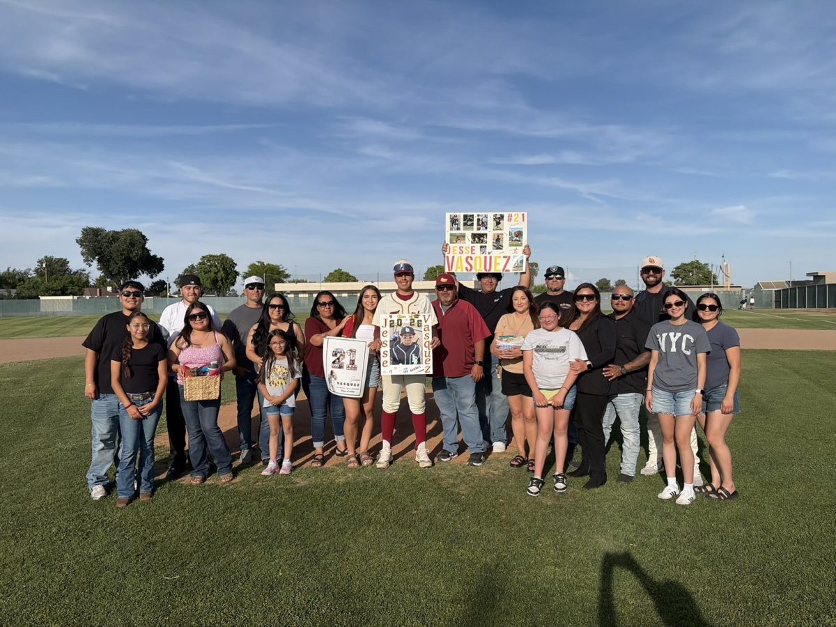 Varsity pitcher, Jesse Vasquez(12) with his family came to support him on baseball's Senior Night.